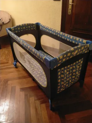 Cuna de viaje azul