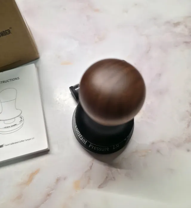 Prensador o tamper de café.