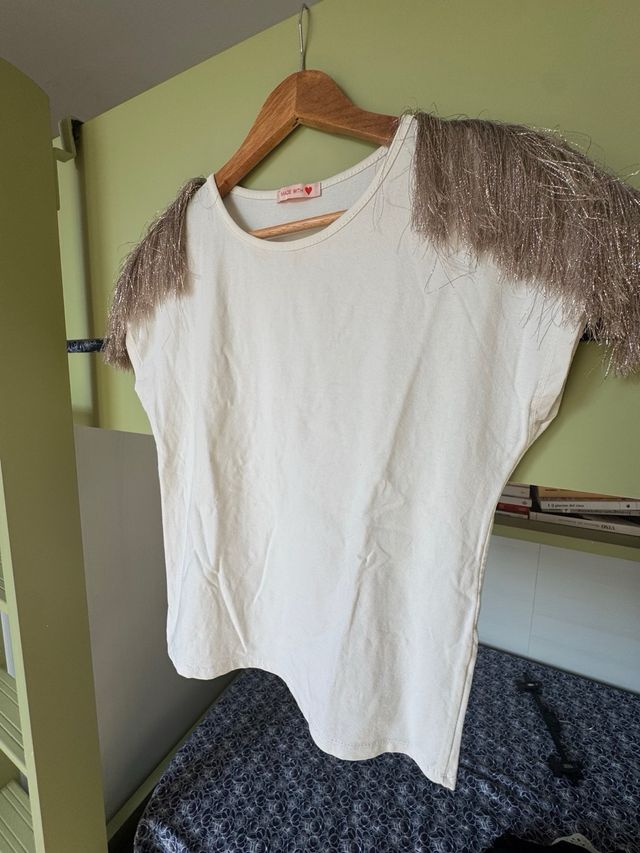 Maglia bianca con frange dorate