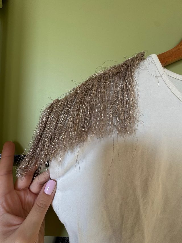 Maglia bianca con frange dorate