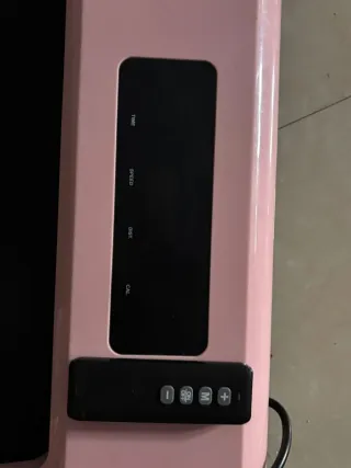 Cinta de correr rosa con mando