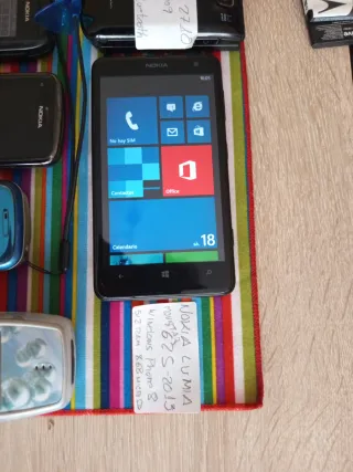 Set Nokia, caricabatterie regalo, cuffie.