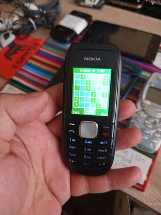 Set Nokia, caricabatterie regalo, cuffie.