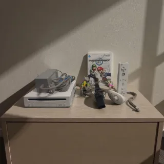 Nintendo Wii con Mario Kart e accessori