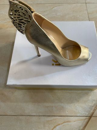 Décolleté oro Marc Ellis con farfalla