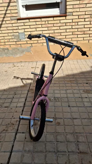 Patinete infantil rosa,con frenos.