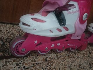 Patines infantiles rosas y blancos