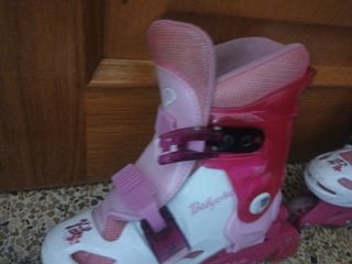 Patines infantiles rosas y blancos