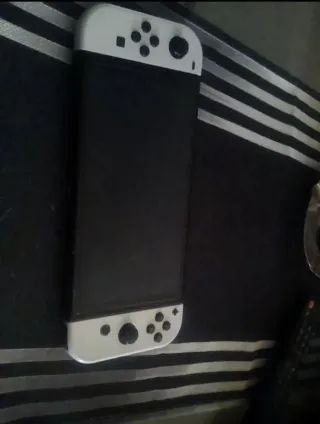 Nintendo Switch OLED Blanca y Negra