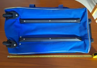 Maleta de viaje azul con estrella