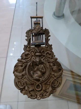 Pendolo antico per orologio