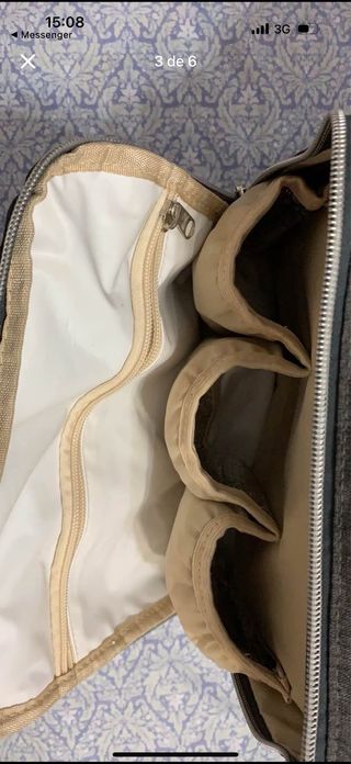 Mochila gris para carrito de bebé