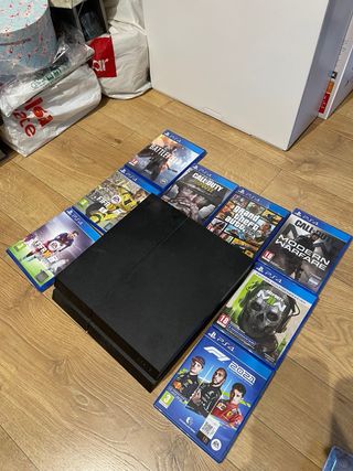PS4 (PlayStation 4) Negra + 7 Juegos 