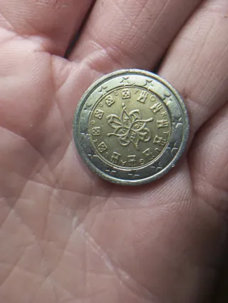 Moneda 2 euros Portugal fallo estrellas