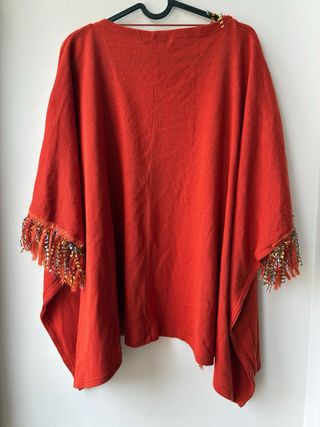 Chaqueta naranja con flecos multicolor