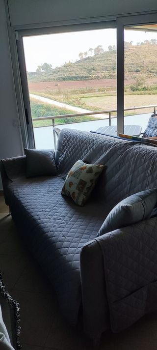 Sofá cama NUEVO POR ESTRENAR de tela gris