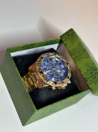 Reloj Dorado y Negro Elegante 