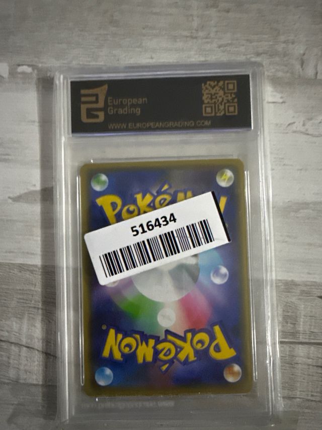 Carta Pokémon Reshiram & Charizard Gx gradeada