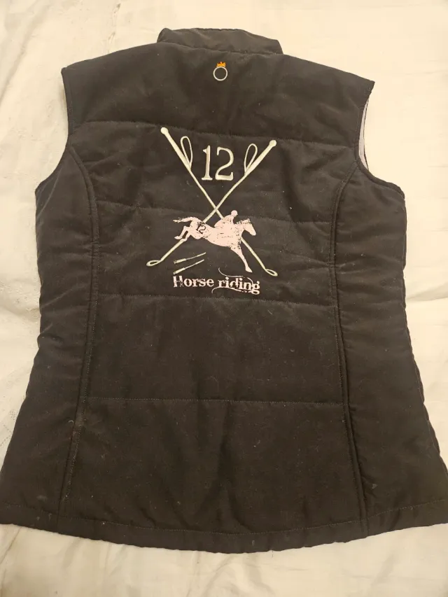 Chaleco Equitación Fouganza Negro y rosa niña t14?