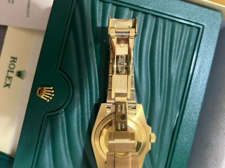 Reloj Rolex Dorado y Verde con Caja y Documentació