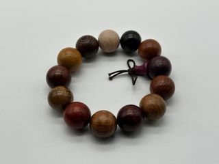 Set Braccialetti Buddisti Legno
