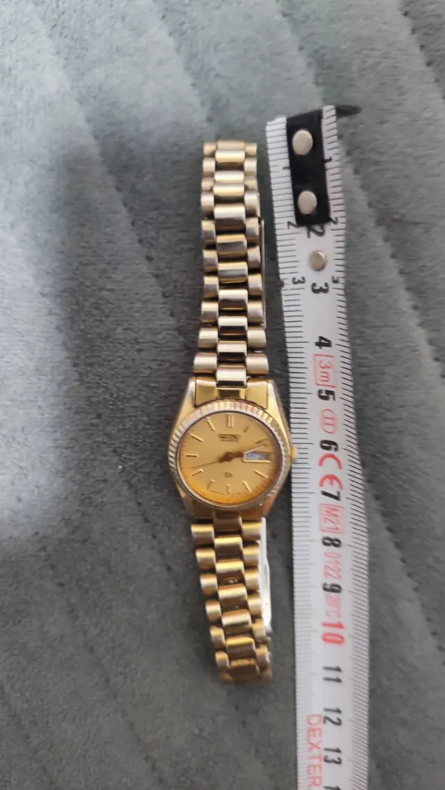 Reloj Seiko Dorado y Plateado