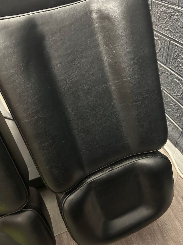 Sillón de tatuaje hidráulico.