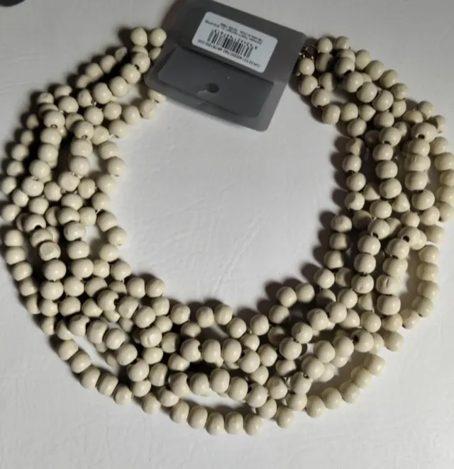 Collar de madera beige ondas