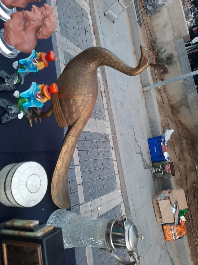 Antico airone bronzeo