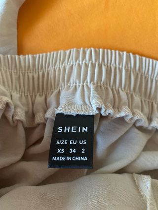 Conjunto pantalón y blusa beige