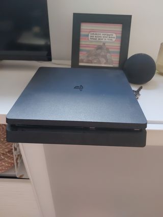 PS4 (PlayStation 4) Negra, dos mandos y 3 juegos