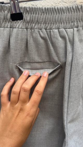 Pantalón gris pinzas largo