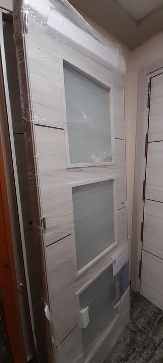 Puerta de comedor con cristal
