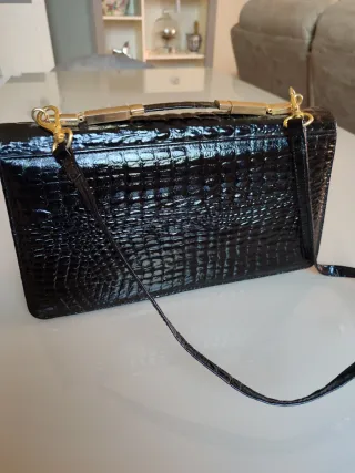 Bolso piel negro cocodrilo dorado