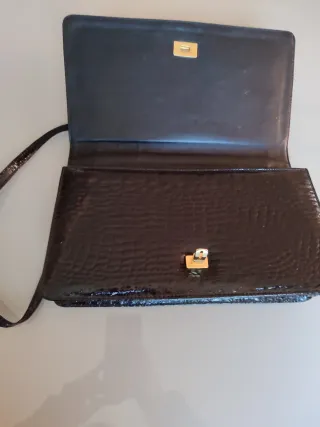 Bolso piel negro cocodrilo dorado