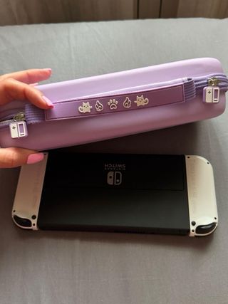 Nintendo Switch OLED bianca + 12 mesi Online