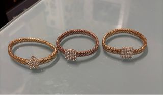 Pulseras de acero en dorado