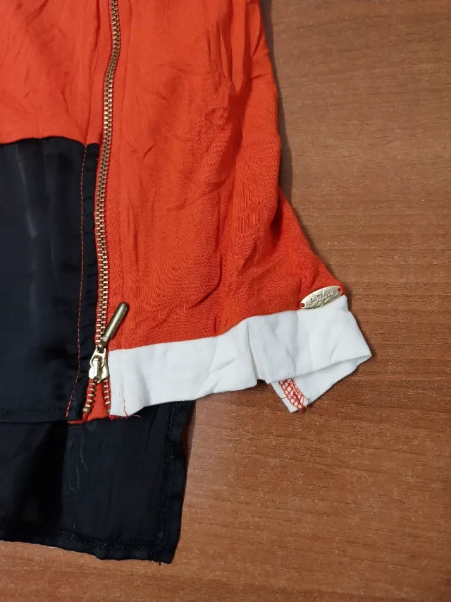 Camiseta manga larga naranja y negra