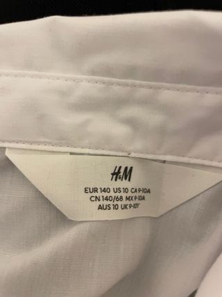 Traje niño negro y camisa blanca
talla 9-10