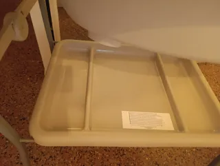 Cambiador de bebé con bañera