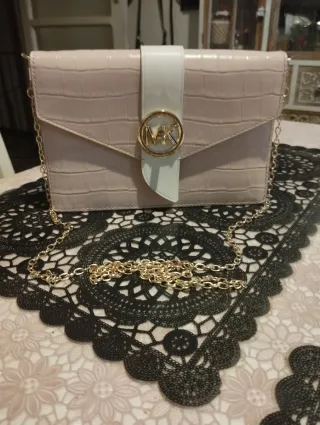 Borsa Michael Kors rosa con logo MK