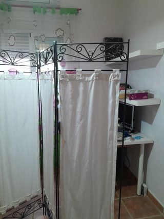 Biombo de forja con cortinas