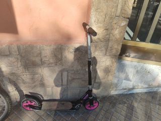 Patinete Oxelo con ruedas rosas