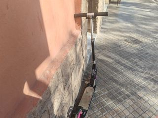 Patinete Oxelo con ruedas rosas