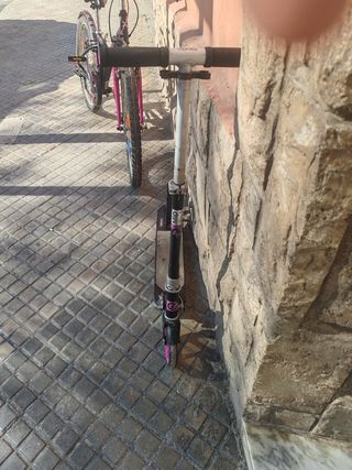 Patinete Oxelo con ruedas rosas