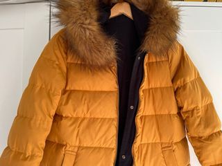 Parka reversible con plumas y capucha  