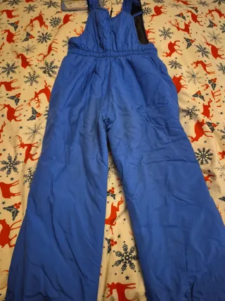 Conjunto anorak y peto azul para unos 7 años,