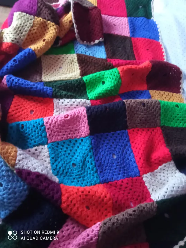 Manta tejida a mano multicolor