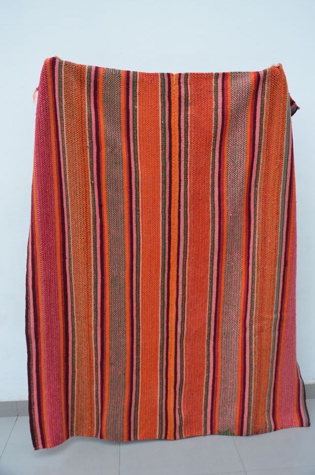 Tapete artesanal de lã