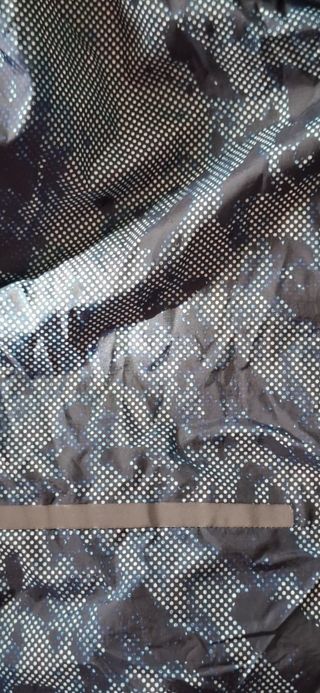 Antivento running con inserti riflettenti